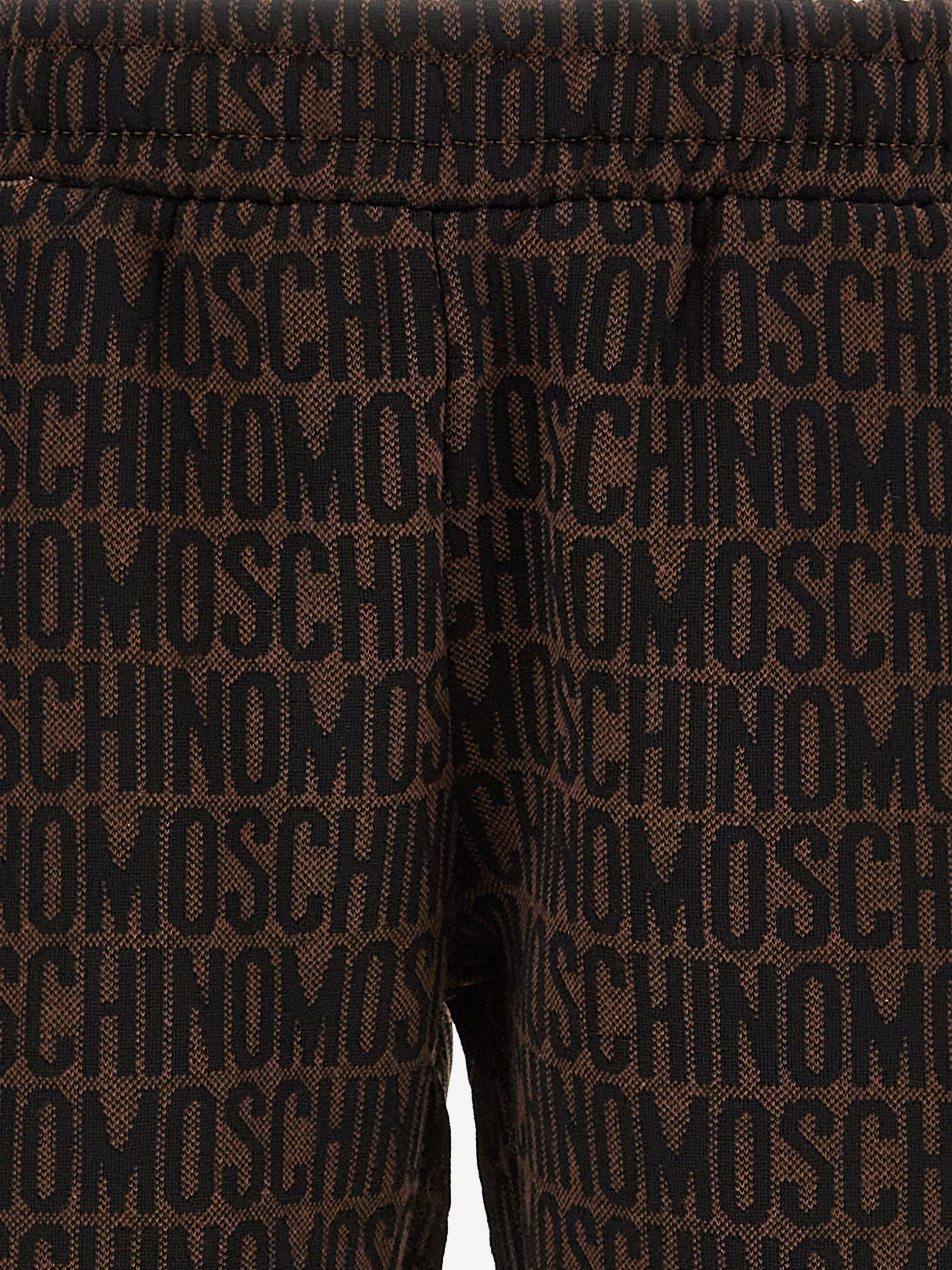 Moschino Boys All Over Logo Shorts in Brown