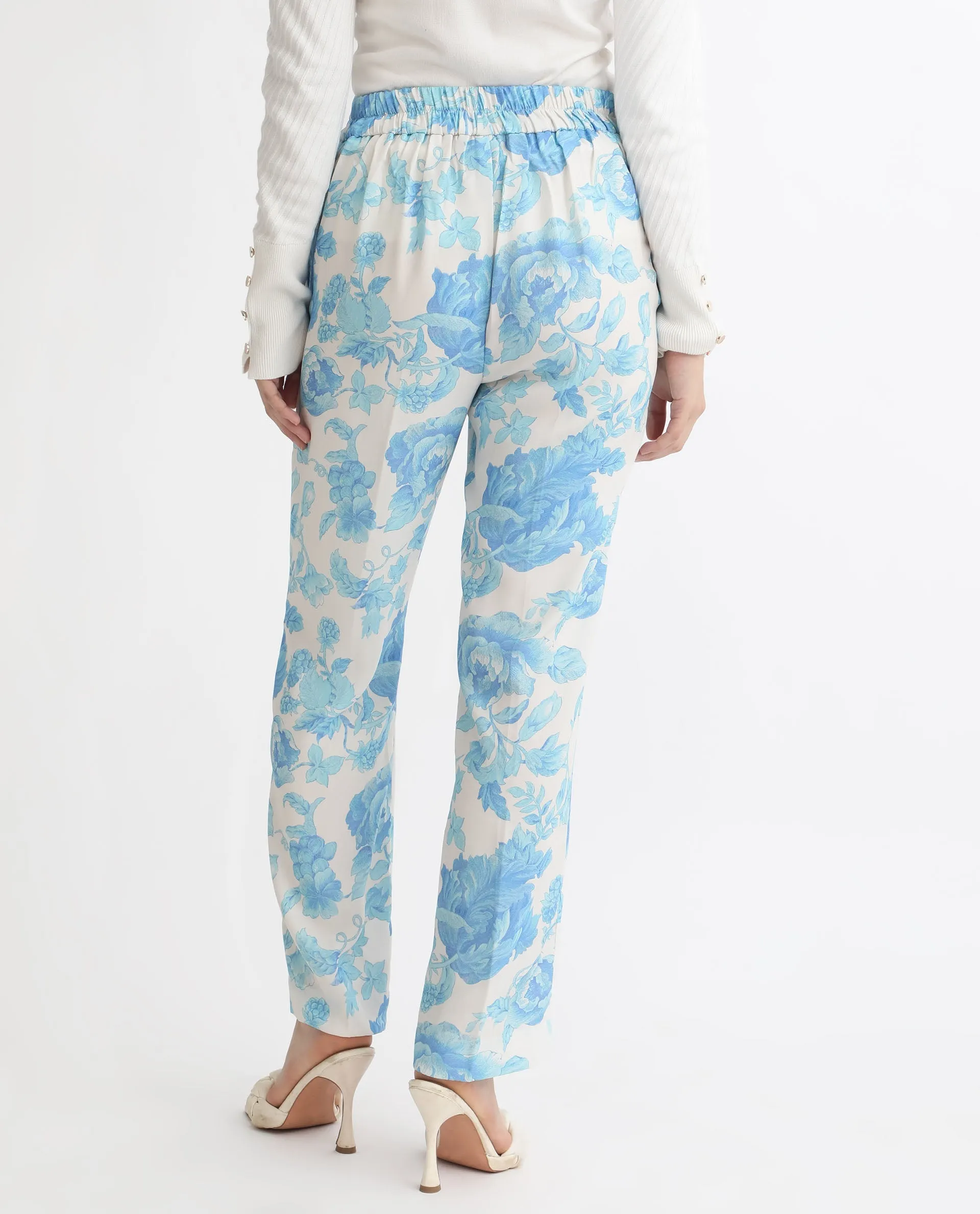 Rareism Women Mongo Light Blue Polyester Fabric Relaxed Fit Floral Print Ankle Length Trousers