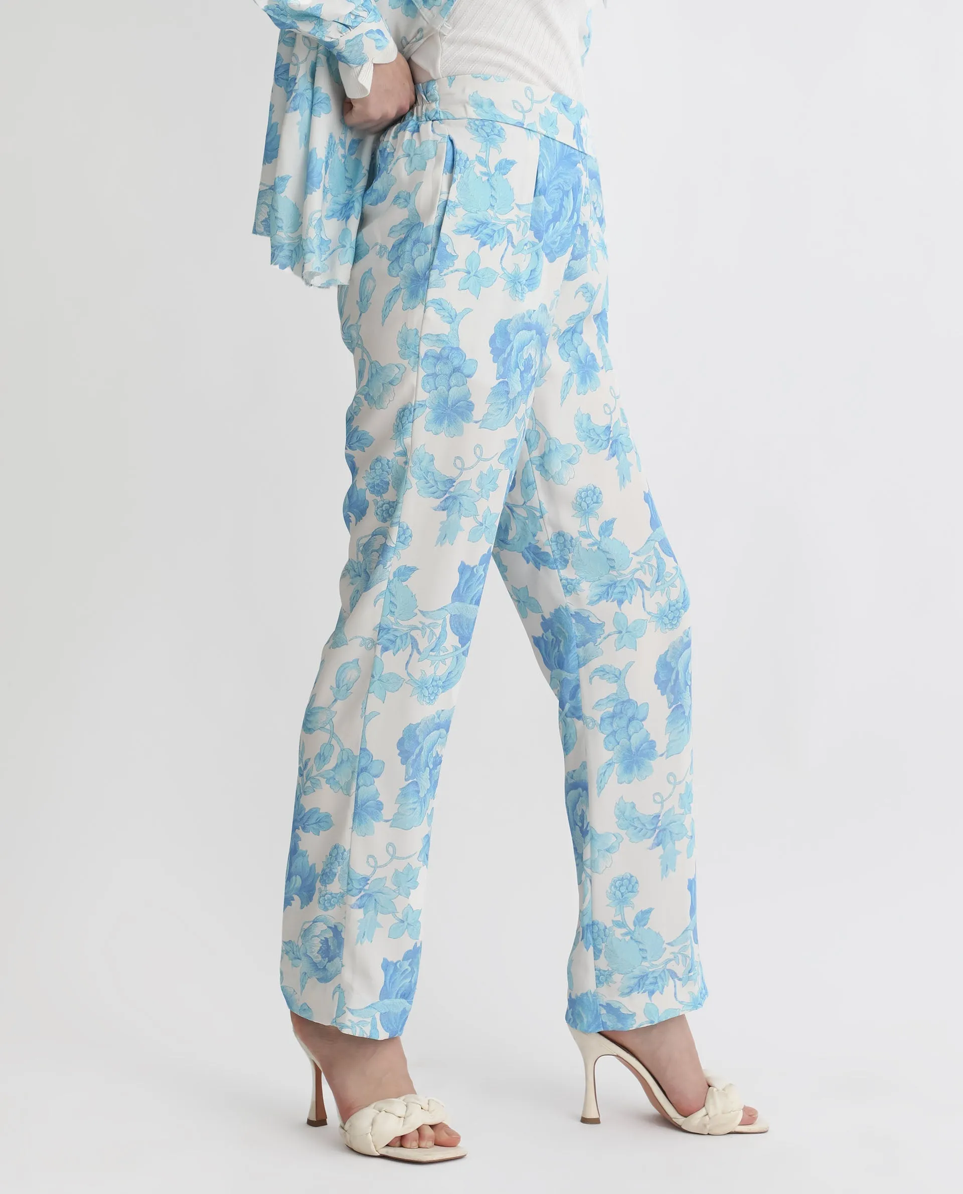 Rareism Women Mongo Light Blue Polyester Fabric Relaxed Fit Floral Print Ankle Length Trousers